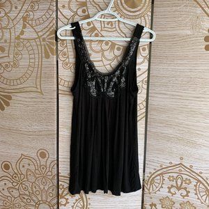 black flowy tank with sparkly collar detail